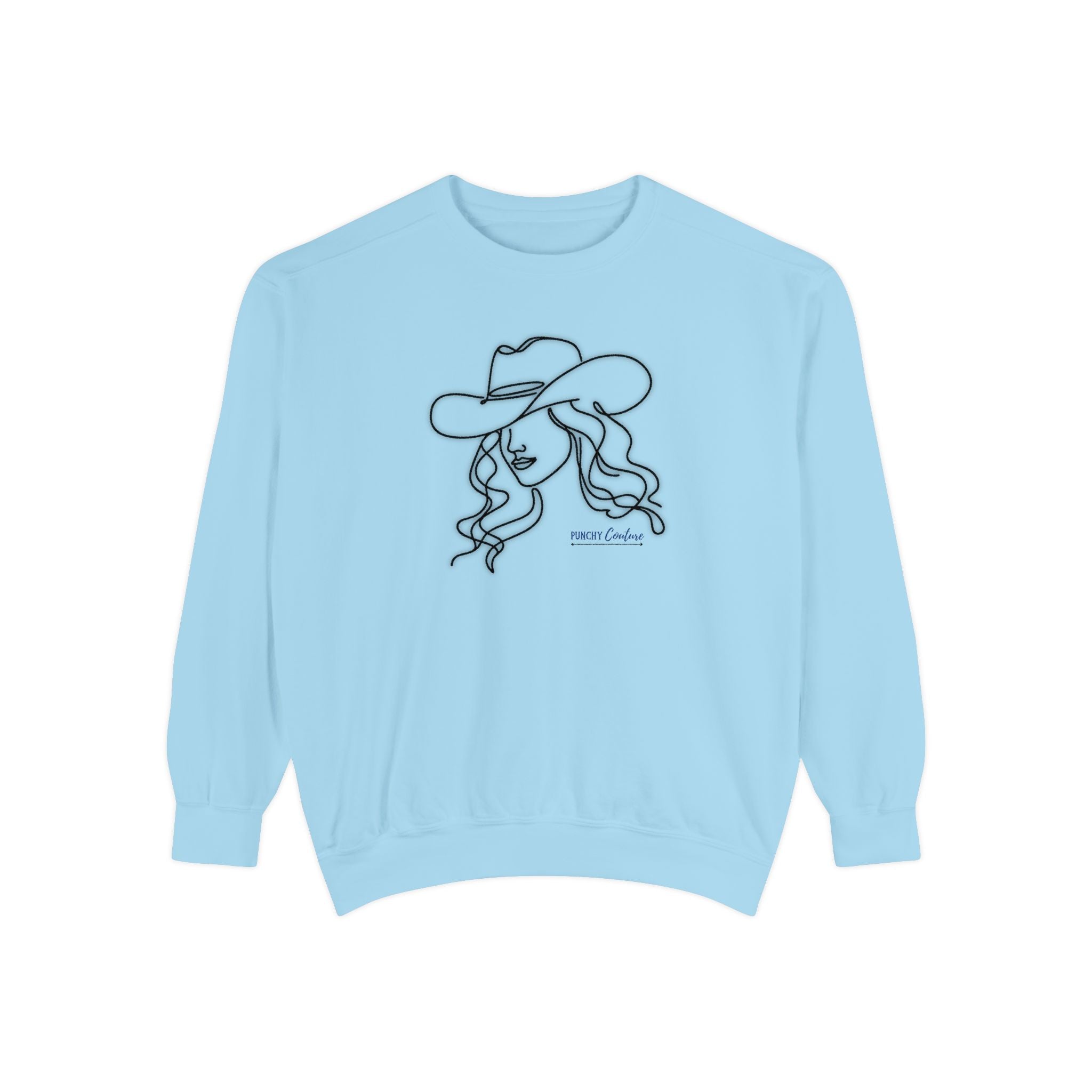 Light blue sweatshirt with black line art of a cowgirl in a wide-brimmed hat and flowing hair; minimalist Western design featuring