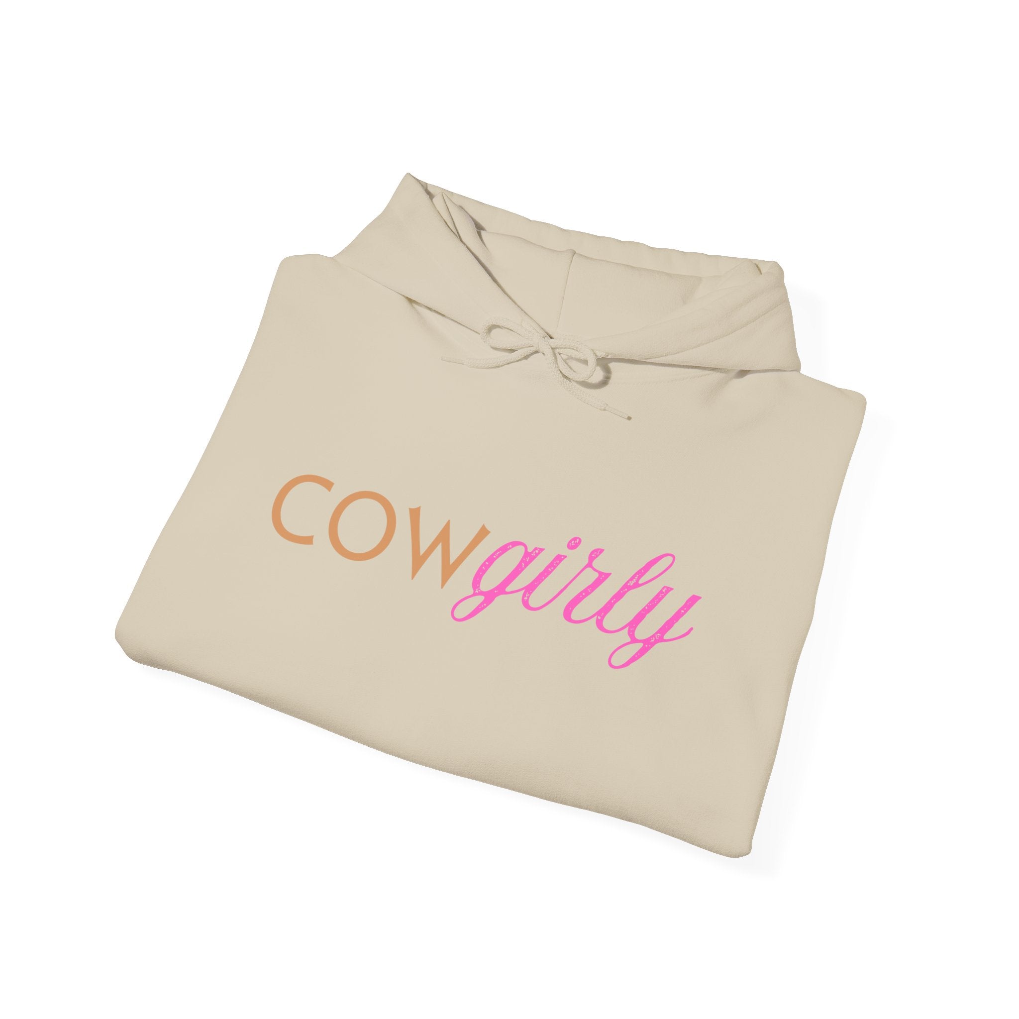 Beige hooded sweatshirt with orange block "COW" and pink cursive "girly" printed across the chest; cozy Western-inspired design blending rustic charm with feminine flair.
