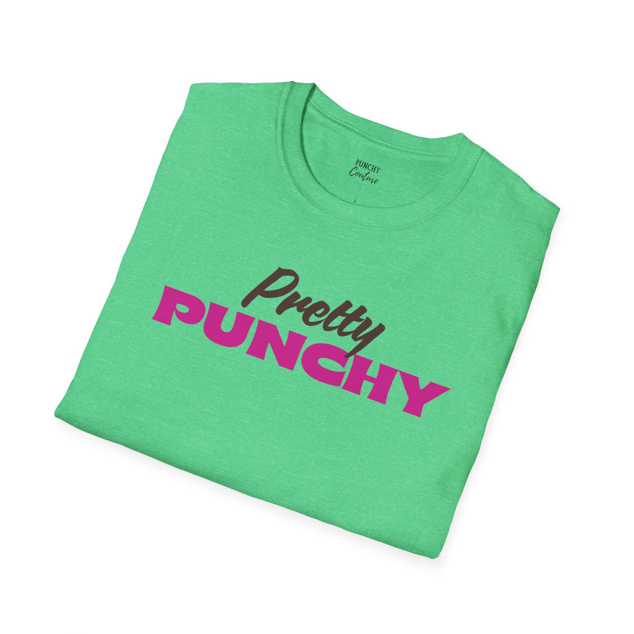 Green t-shirt with brown cursive "Pretty" and bold magenta "PUNCHY" lettering centered on the chest; expressive Western graphic tee with playful, confident energy