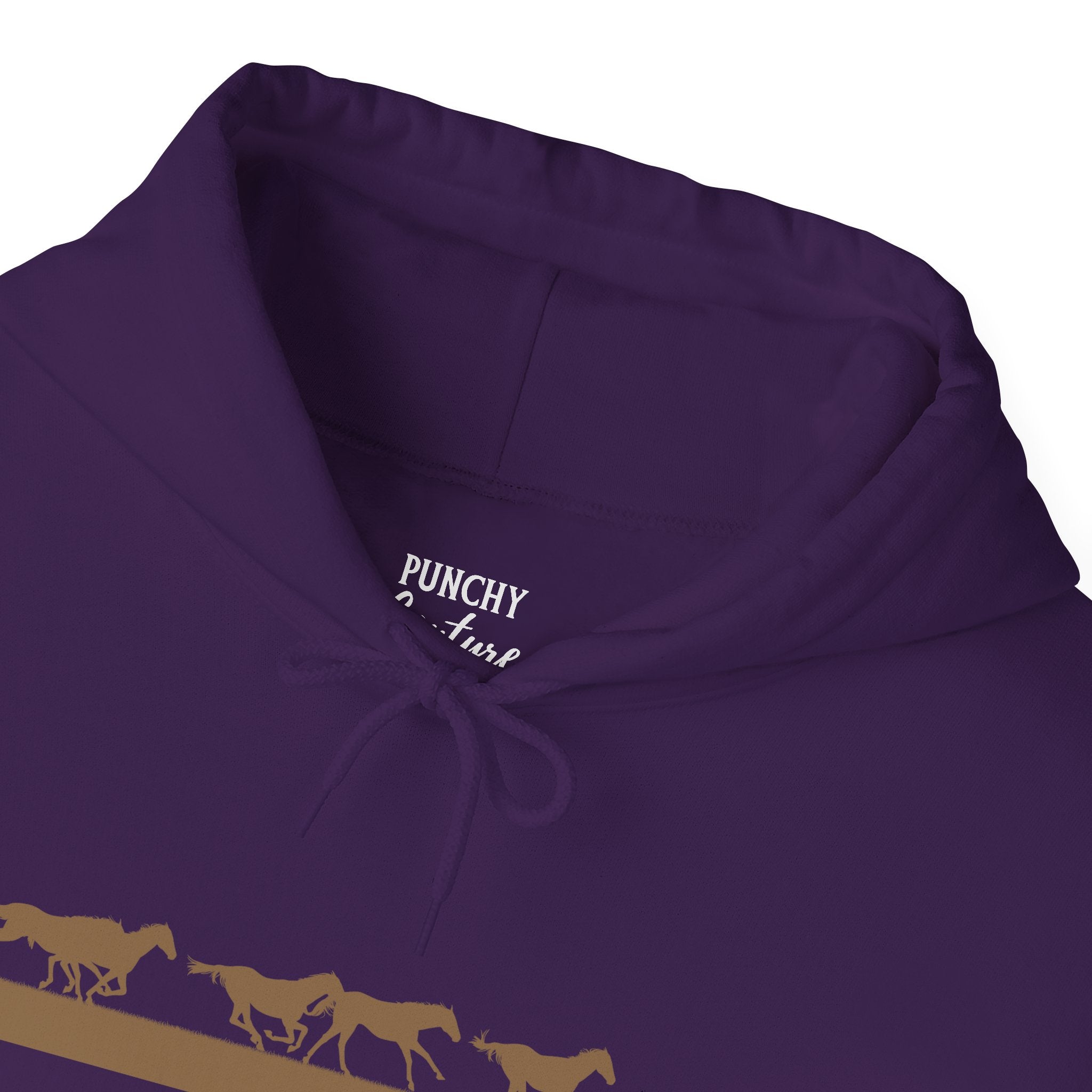 Purple hooded sweatshirt with golden horse silhouettes in motion across the chest above a solid gold bar; dynamic Western design celebrating movement and strength.